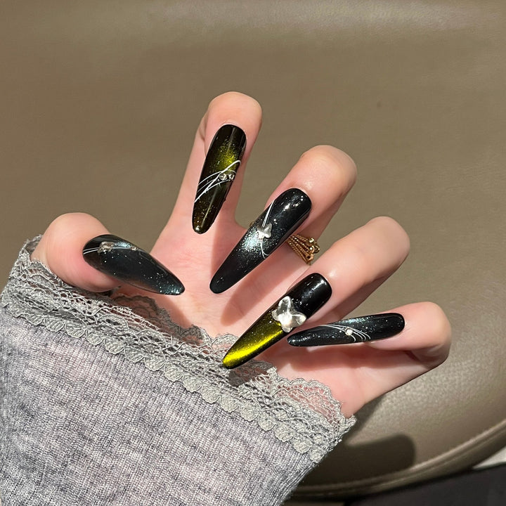 Artistic Stiletto Nail Extensions with Metallic Accents Stornfield