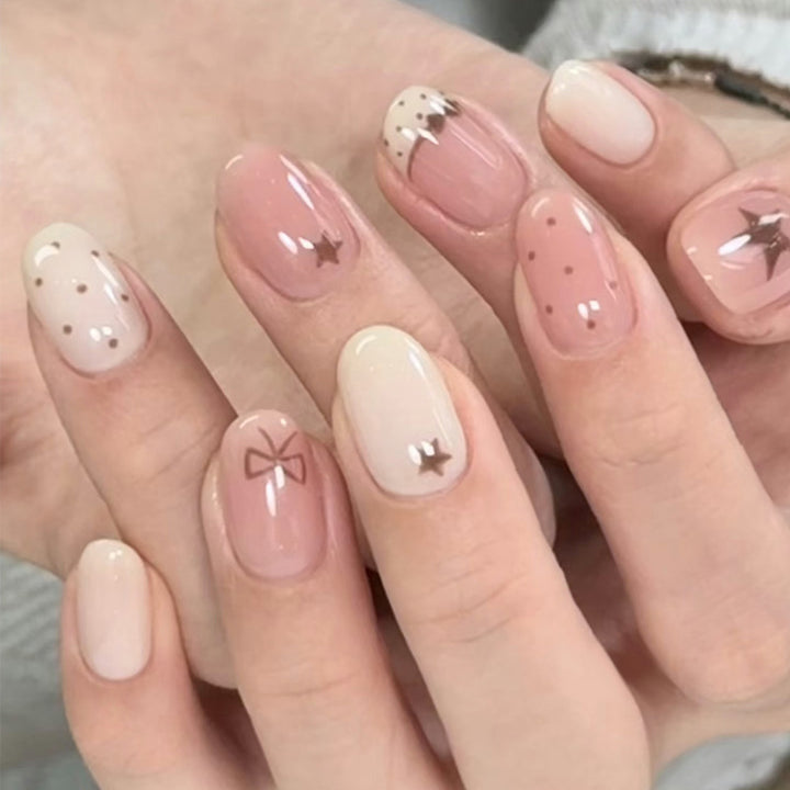 Artistic Press-On Nail Set with Bow and Star Embellishments Stornfield