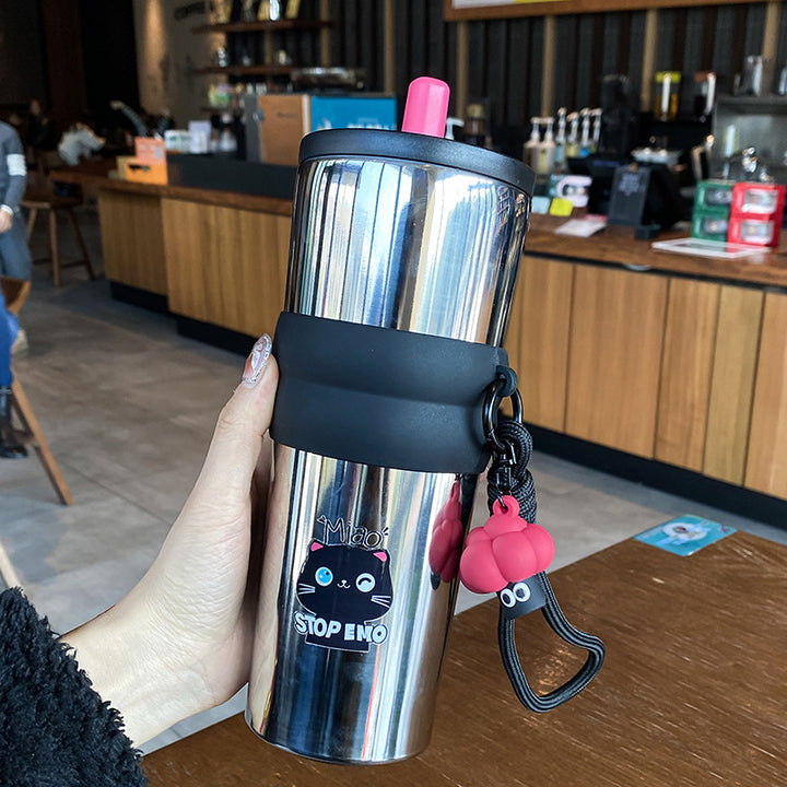 Women's playful coffee mug with silicone sleeve and integrated pendant Stornfield