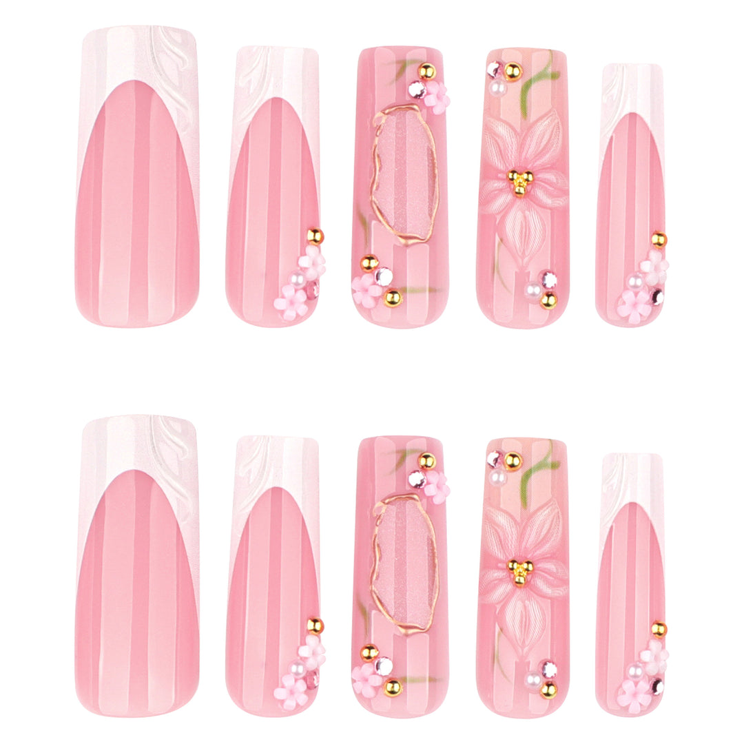 Artful nail extensions with floral embellishments Stornfield