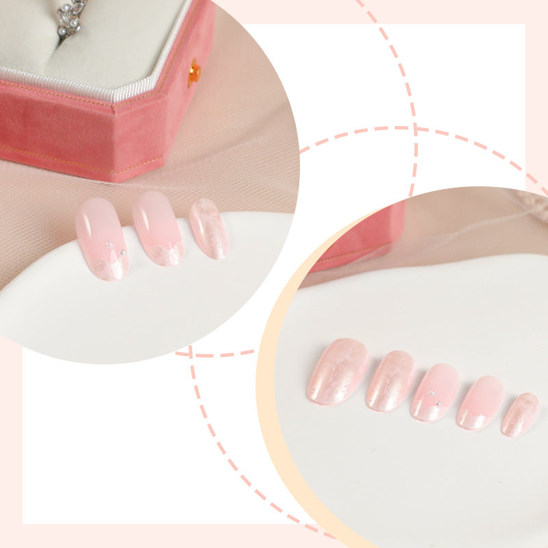 Artificial nail set with shimmering pearl and glittering accents Stornfield