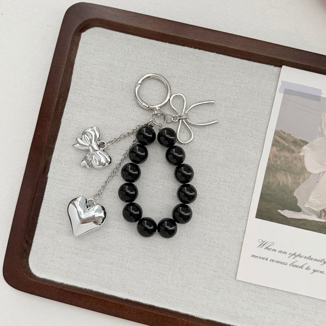 Elegant Heart and Bow Charm Keychain Stornfield