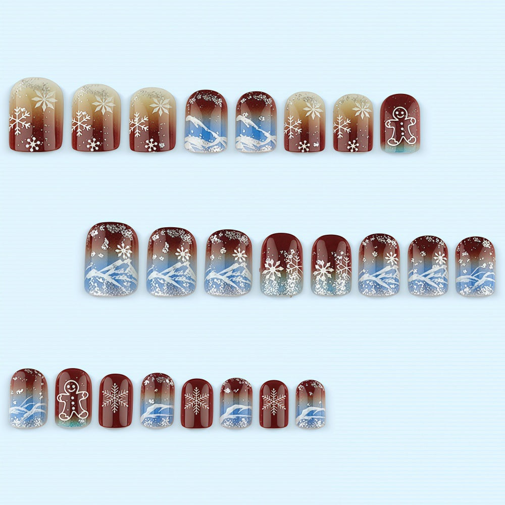 Artificial nails with festive snowflake and gingerbread motif Stornfield
