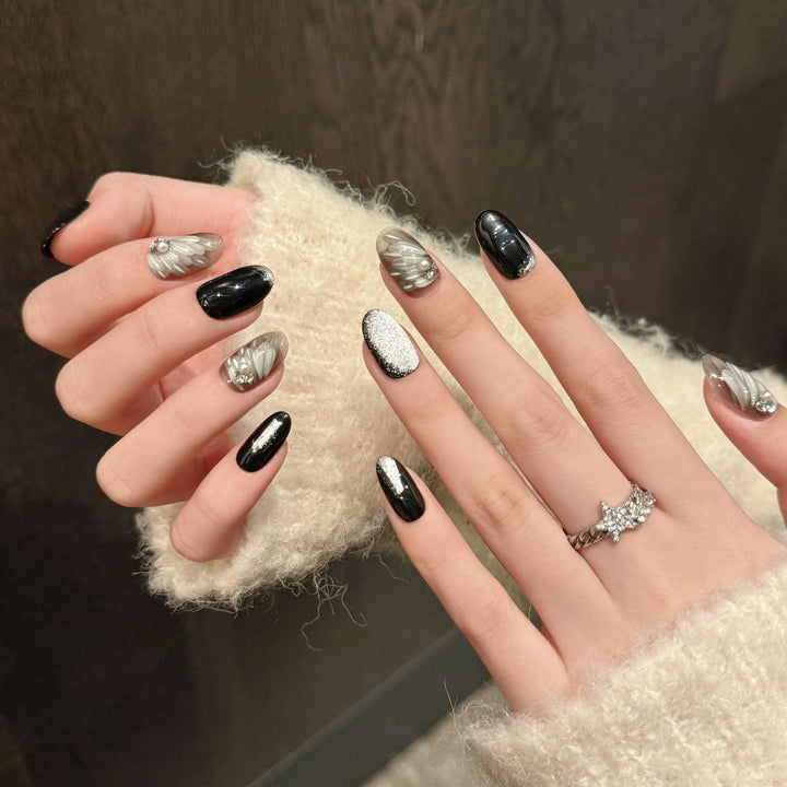 Artistic Press-On Nail Set with Elegant Silver and Black Designs