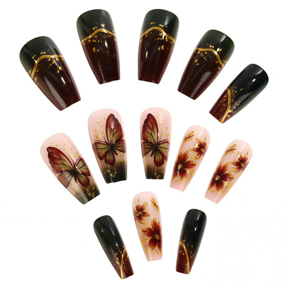Artificial nails with elaborate butterfly and flower designs Stornfield