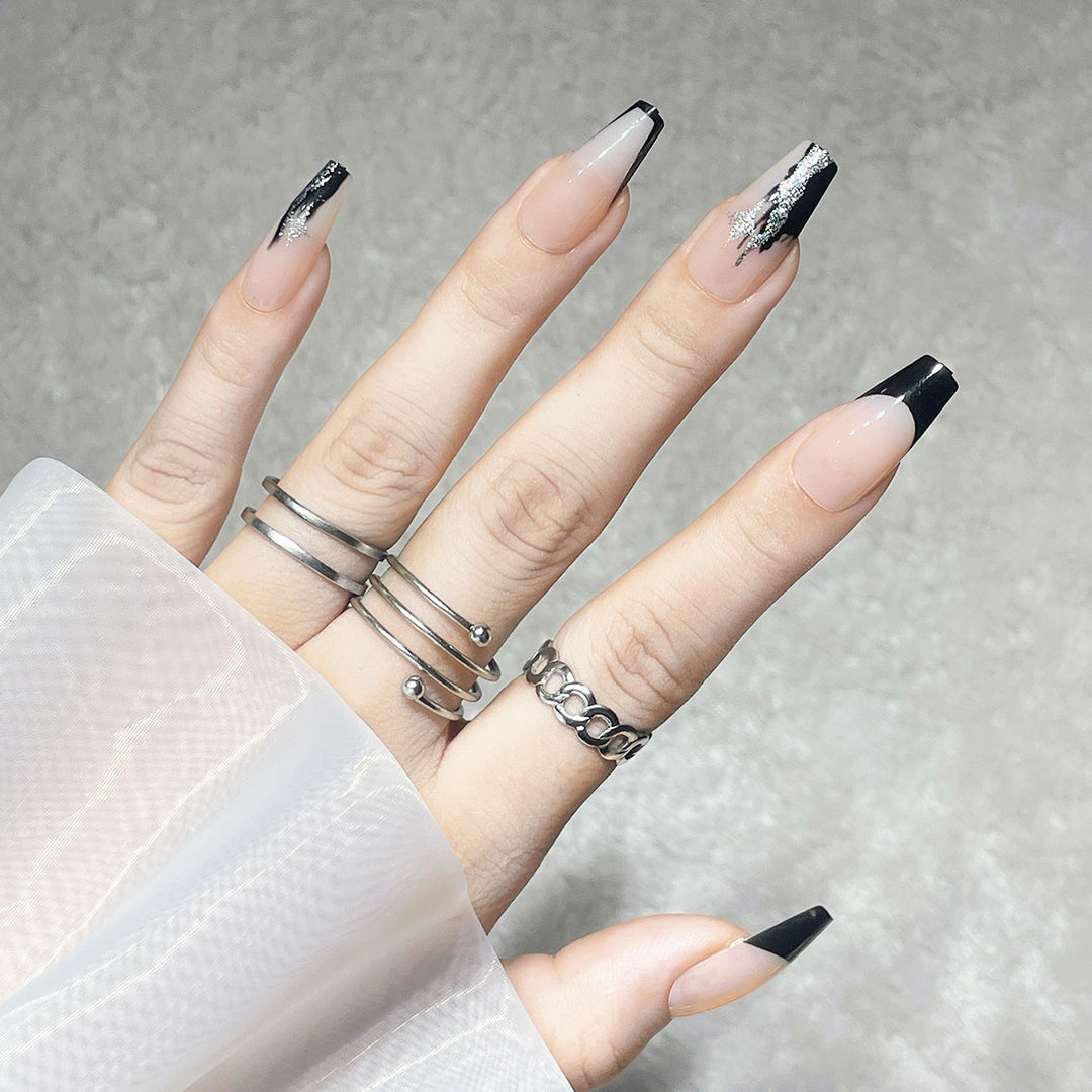 Elegant Stiletto Press-On Nails with Artistic Black Tips and Silver Accents Stornfield