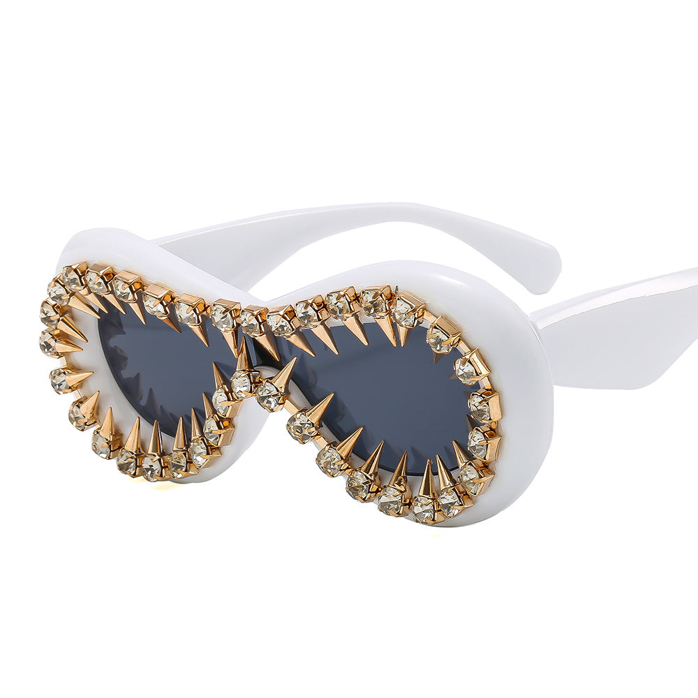 Women's fashionable sunglasses with extravagant spikes and crystal embellishments Stornfield