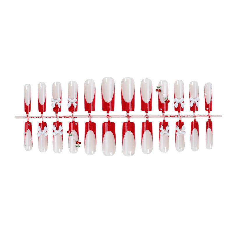 Creative nail set with festive cherry motifs Stornfield