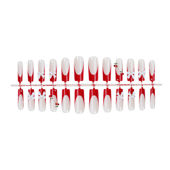 Creative nail set with festive cherry motifs Stornfield
