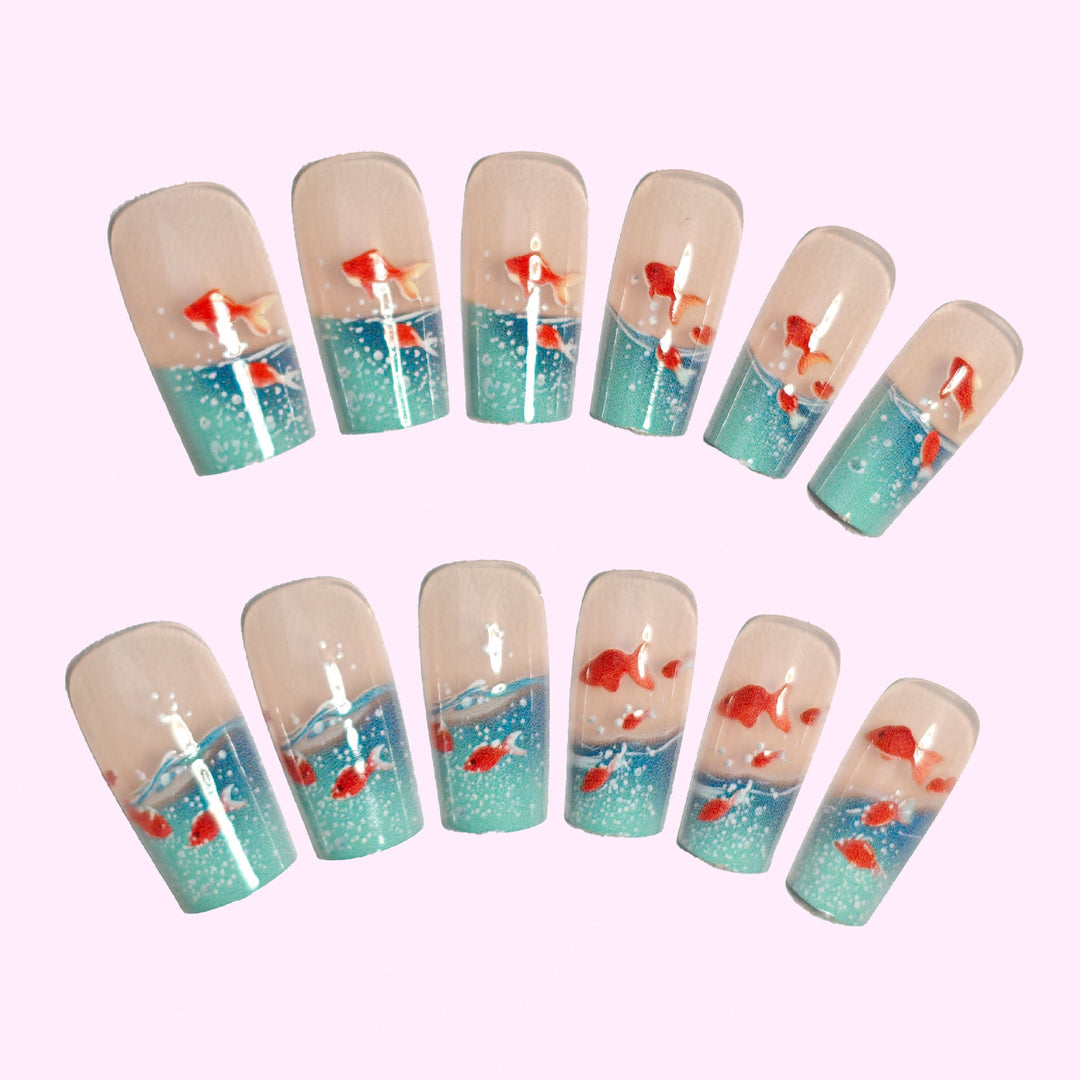 Artifical nails with maritime goldfish design Stornfield