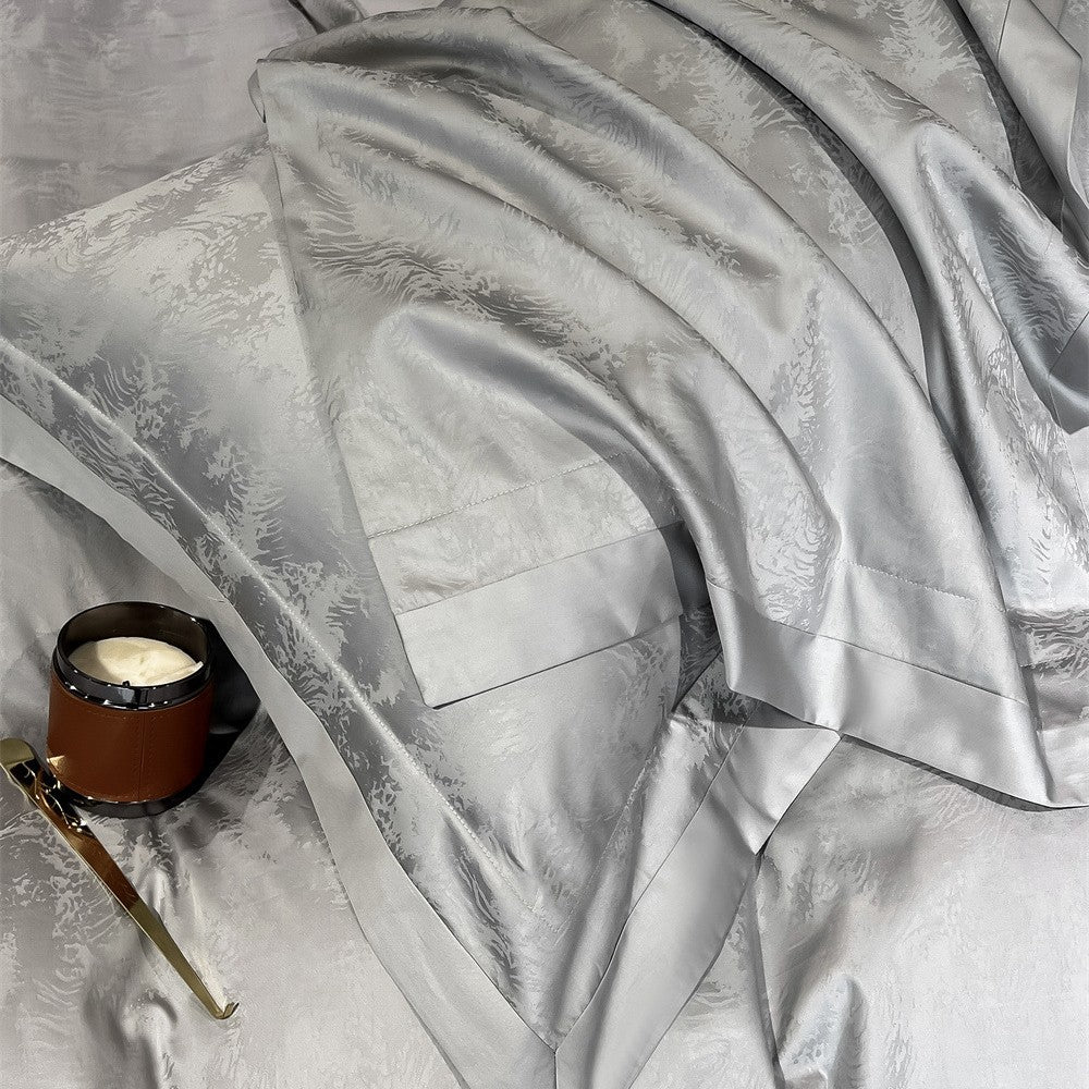 Luxurious cotton satin bedding set with jacquard relief and contrast piping