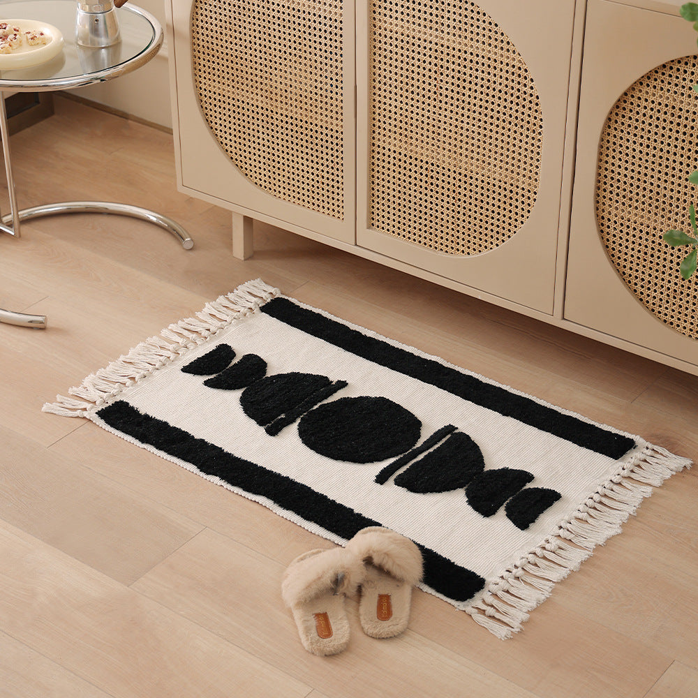 handwoven cotton runner with fringe and embossed relief pattern