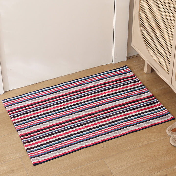 Striped cotton doormat with non-slip bottom and decorative woven edge Stornfield