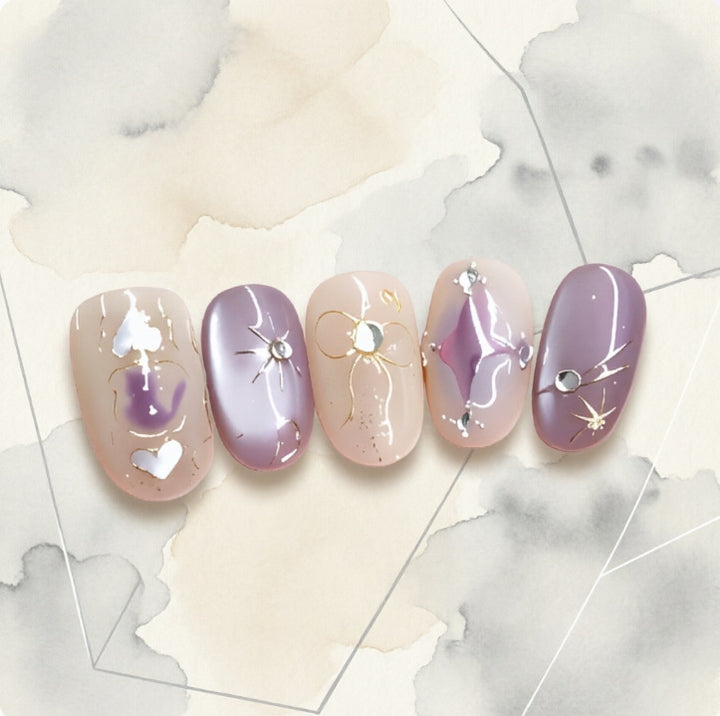 Artificial nails with playful bow and star design Stornfield