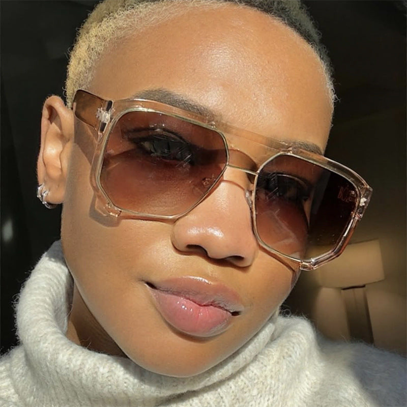 Ladies fashionable oversized sunglasses with elegant, faceted frame construction Stornfield