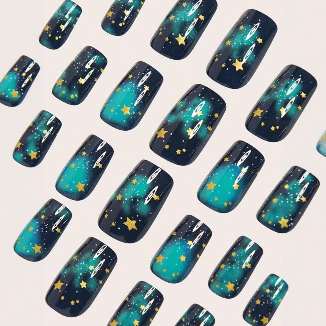 Glitter nail polish with star accents Stornfield