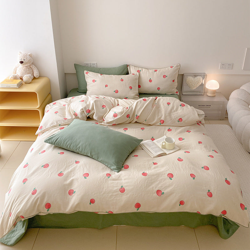 Playful bed linen set made of cotton percale with peach print and reversible function