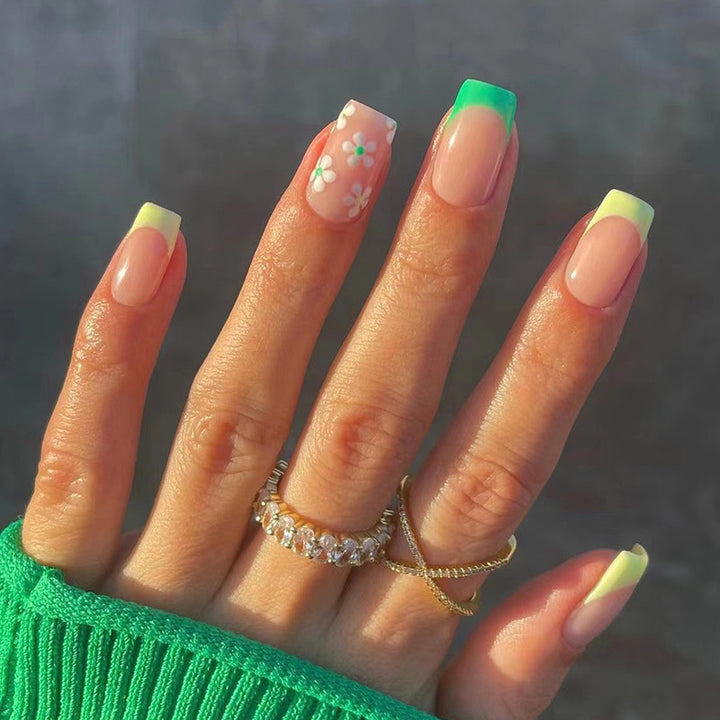 Artful nail extensions with an elegant leaf pattern Stornfield