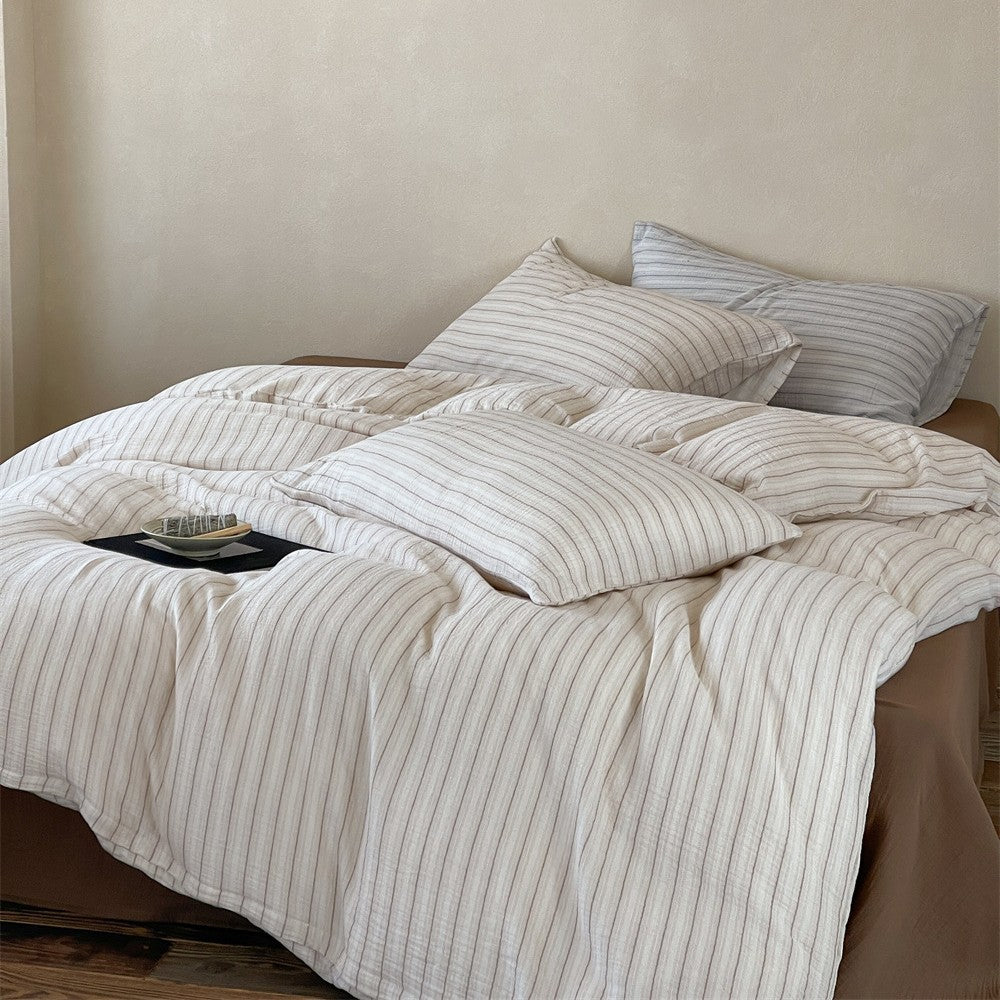 Lightweight muslin bedding set in linen look with fine stripe relief