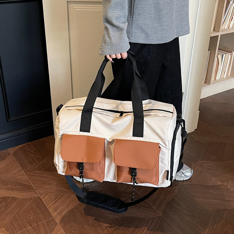 Multifunctional tote bag with comfortable shoulder padding and numerous outer pockets Stornfield