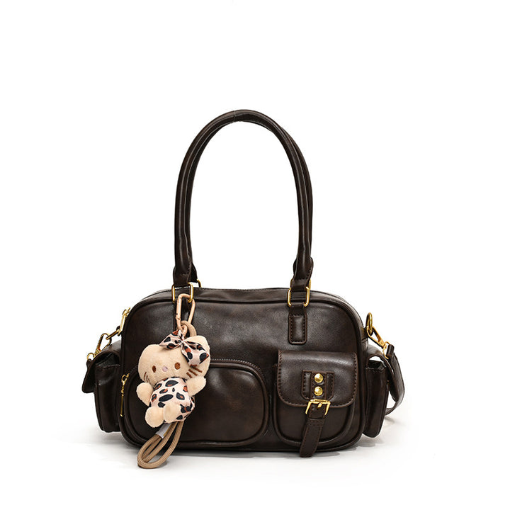 Elegant Handbag with Playful Charms and Multiple Compartments Stornfield