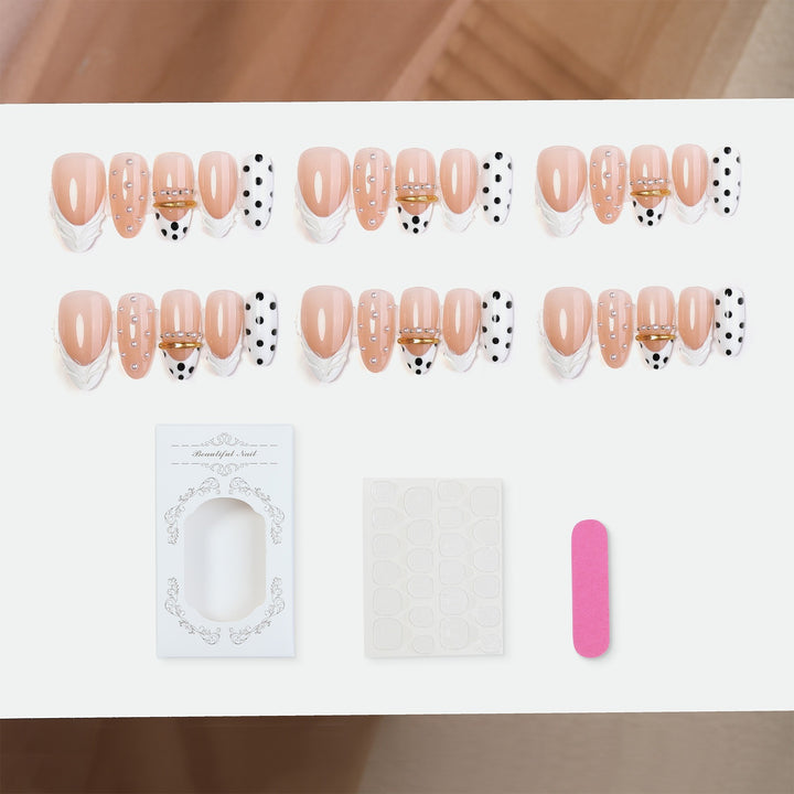 Artificial artificial nails with fashionable dots and embellishments Stornfield