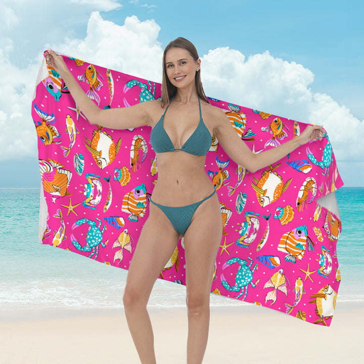 Beach towel with vibrant tropical plant motif Stornfield