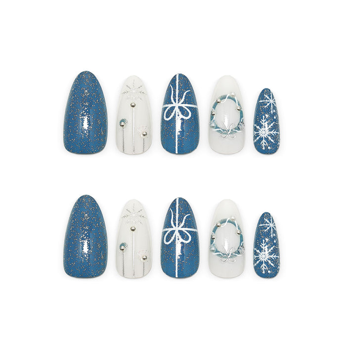 Artificial nails in elegant winter design with glitter accents Stornfield