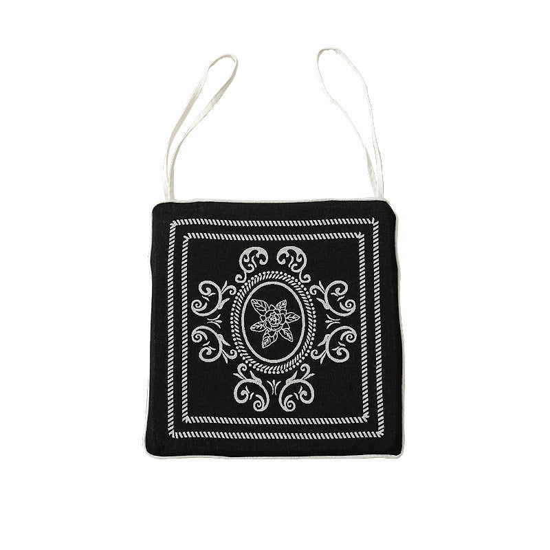Double-sided seat cushion with ties and decorative jacquard pattern Stornfield