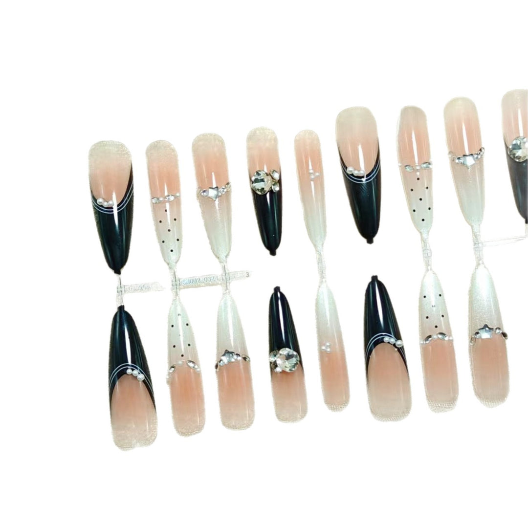 Elegant Artificial Nails with Glitter Accents and Fashionable Design Stornfield