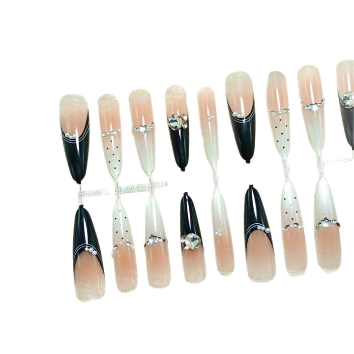 Elegant Artificial Nails with Glitter Accents and Fashionable Design Stornfield