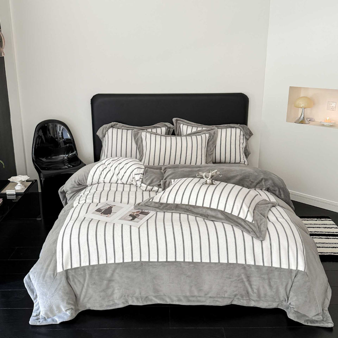 Luxurious bedding set made of striped cotton blend with velvet trim and reversible function