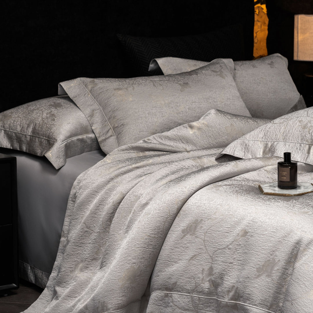 Luxurious satin bedding set with structured crocodile embossing and hotel closure