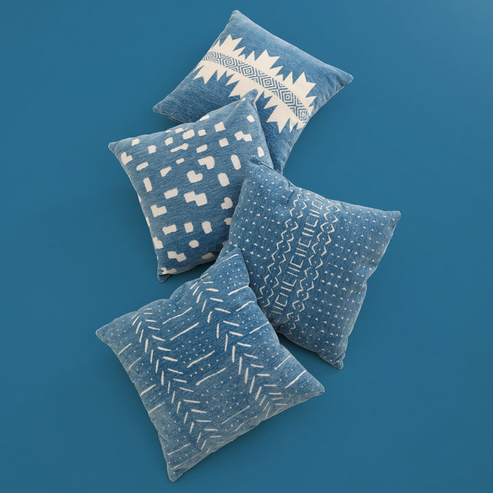 Decorative cushion with abstract pixel pattern and soft bouclé cover