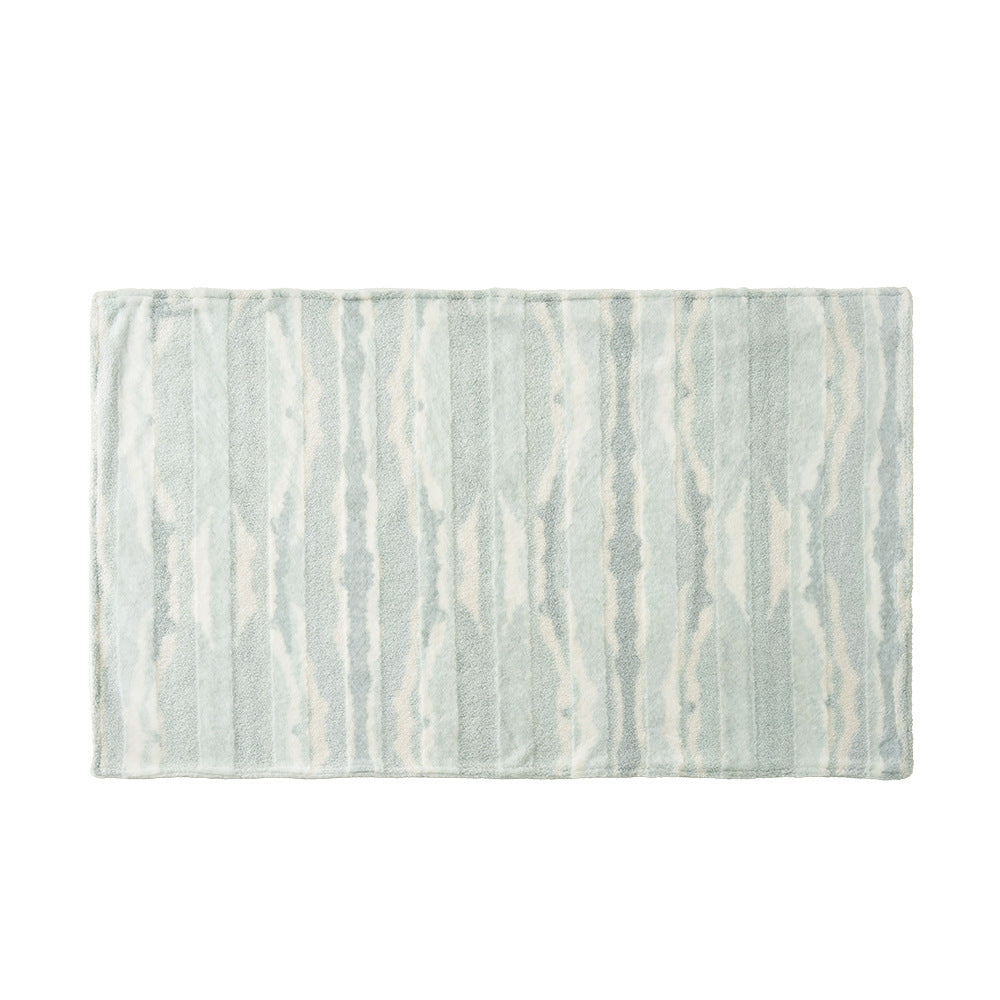 Rectangular high-pile bath mat with wavy stripe relief