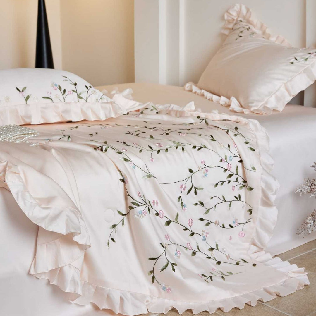 Exclusive satin bed linen set with fine floral embroidery and silky finish