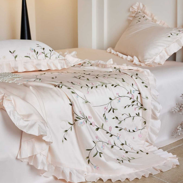 Exclusive satin bed linen set with fine floral embroidery and silky finish