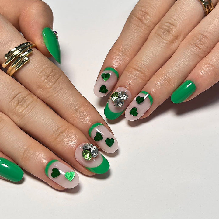 Artistic Nail Extensions with Lovable Heart Patterns and Glitter Accents Stornfield