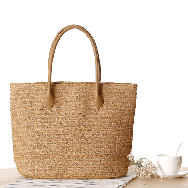 Spacious straw shopper with leather carrying handles Stornfield