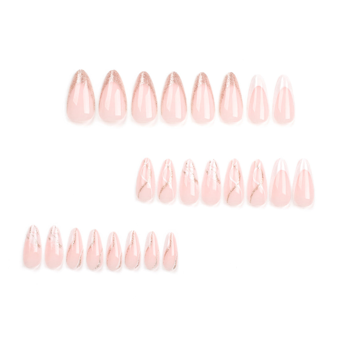 Artful stiletto nails with elegant marble and glitter design Stornfield