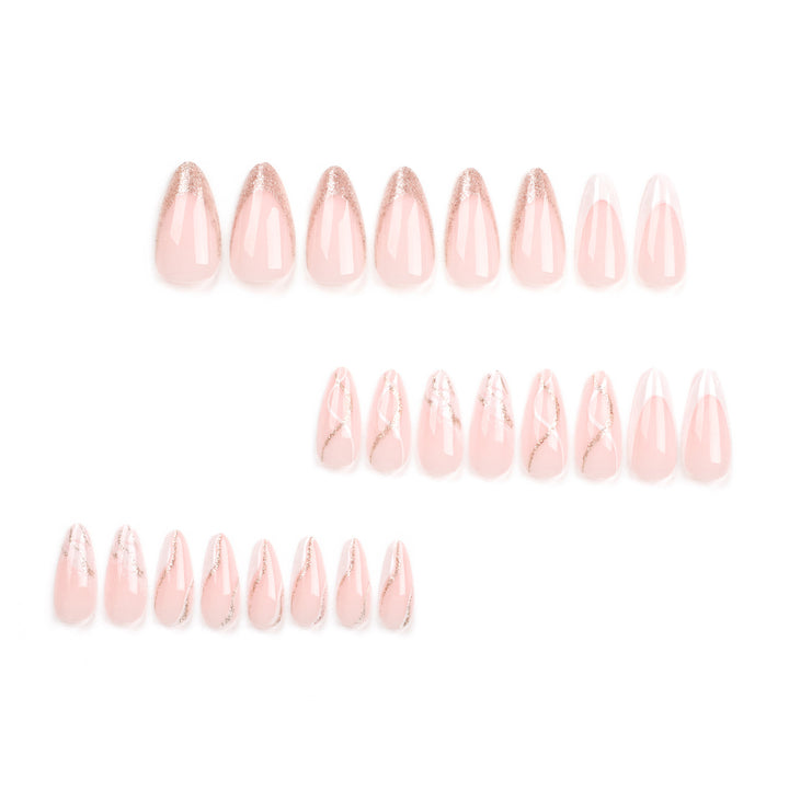 Artful stiletto nails with elegant marble and glitter design Stornfield
