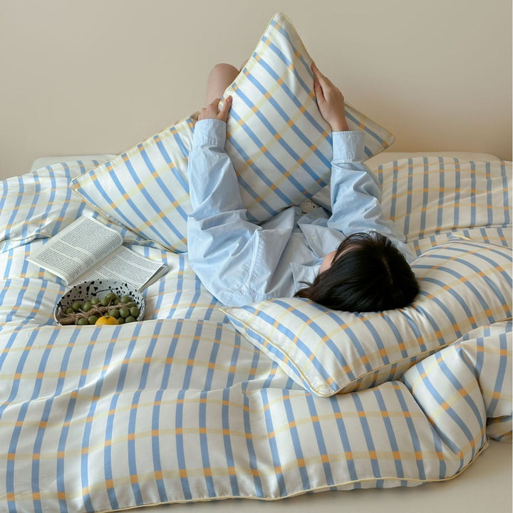 Soft cotton satin bedding with fine check and stripe pattern