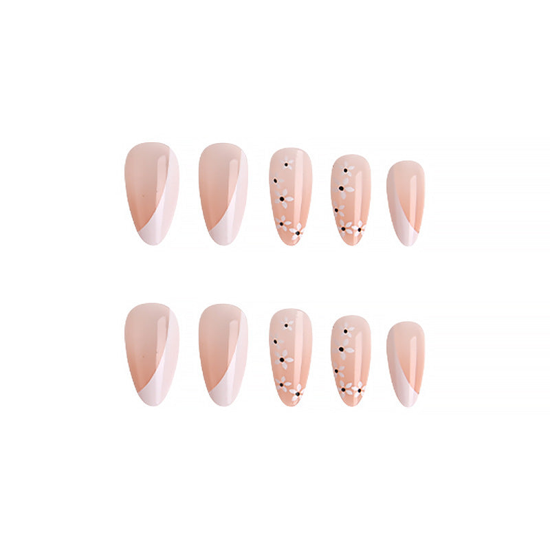 Artistic Nail Tips with Floral Accents Stornfield