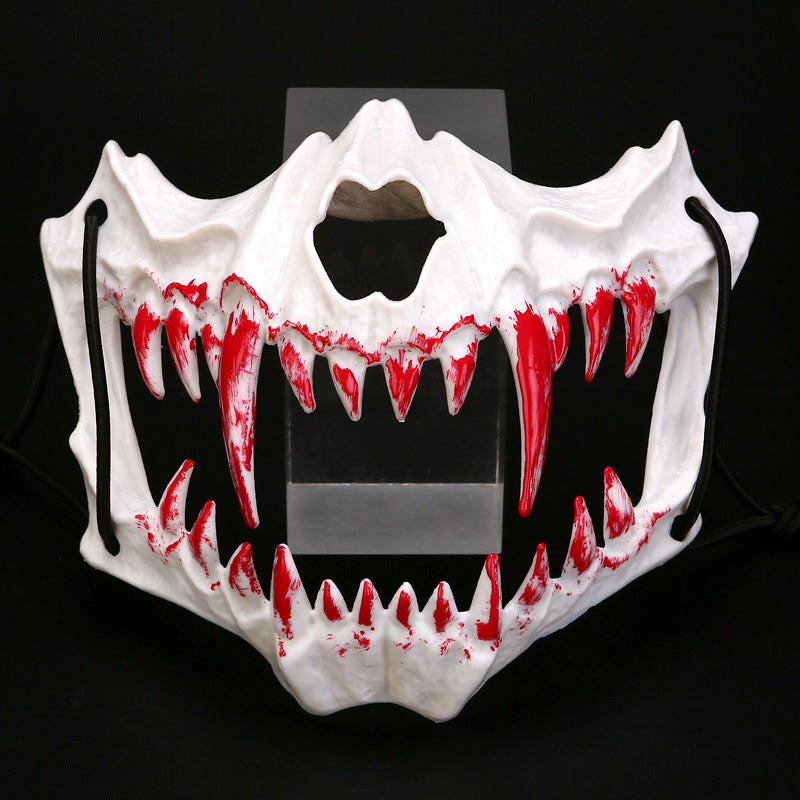 Half-face mask with flashing vampire teeth and adjustable rubber band