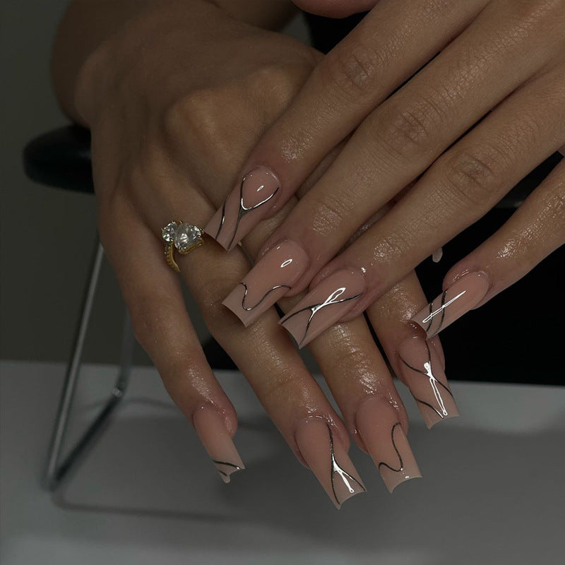 Artistic Press-On Nail Design with Elegant Graphical Accents Stornfield