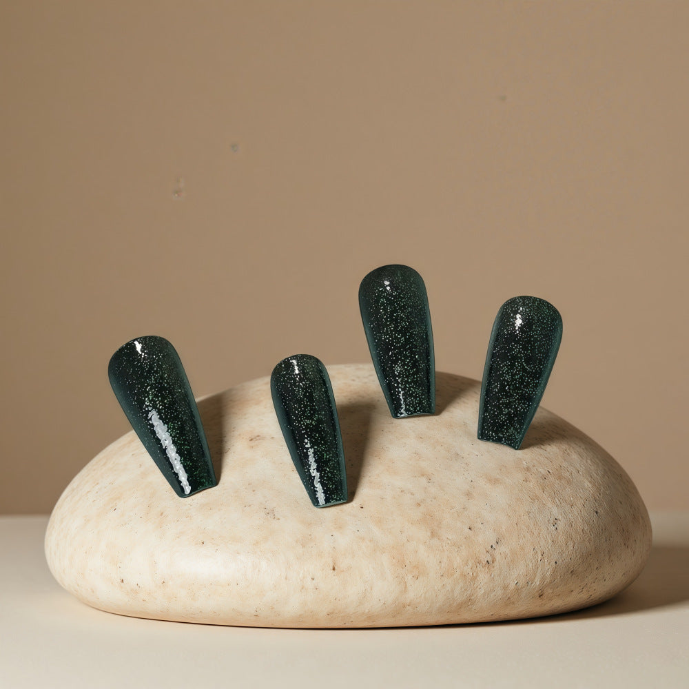 Shiny artificial nails with sparkling accents Stornfield