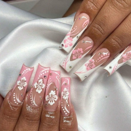 Art nail set with elegant flower design and crystal embellishments Stornfield