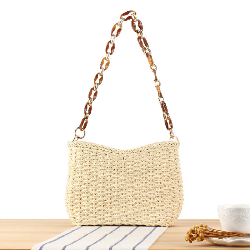Fashionable straw bag with chain strap Stornfield