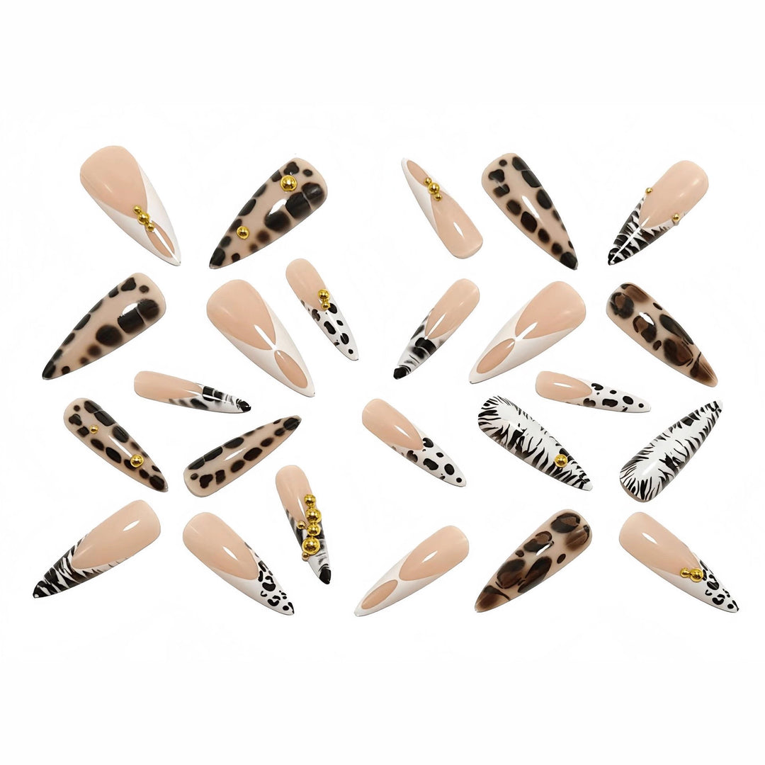 Stiletto fake nails with animal pattern and gold accents Stornfield