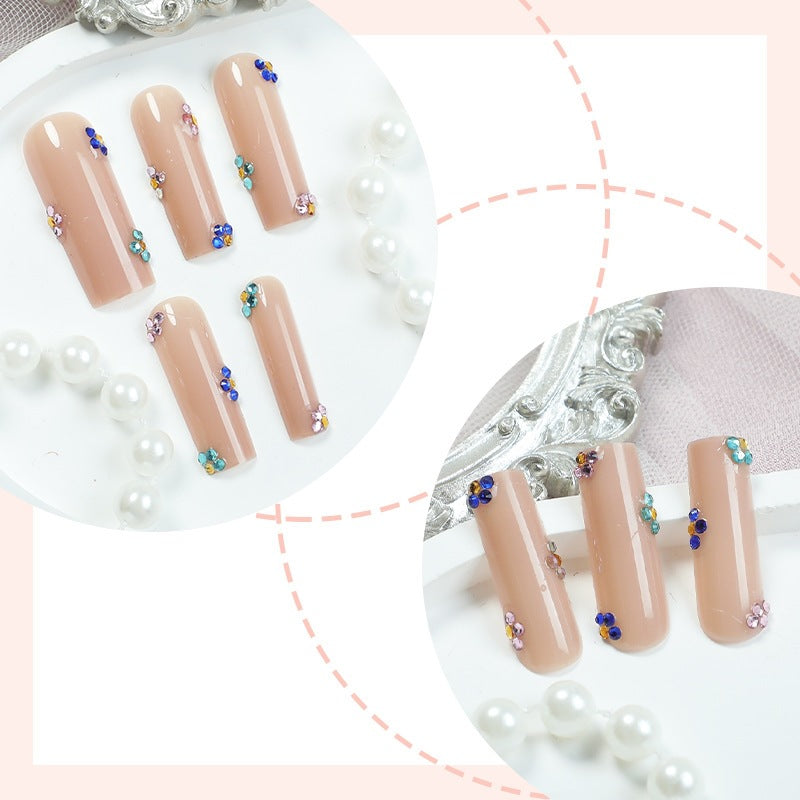 Nail art set with sparkling rhinestone accents Stornfield